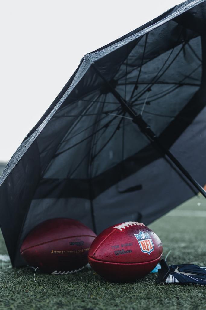 red and black nike soccer ball